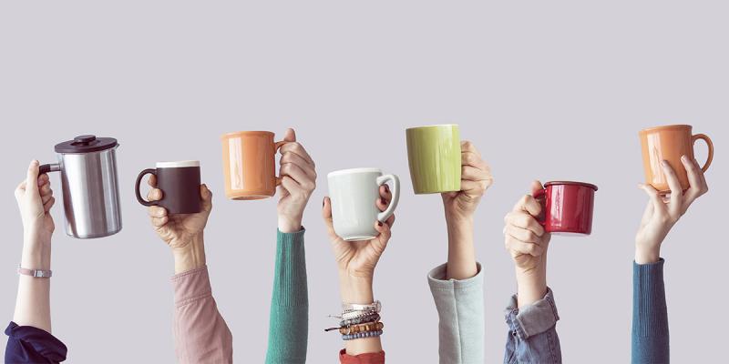 Illustrative picture of hands holding coffee mugs