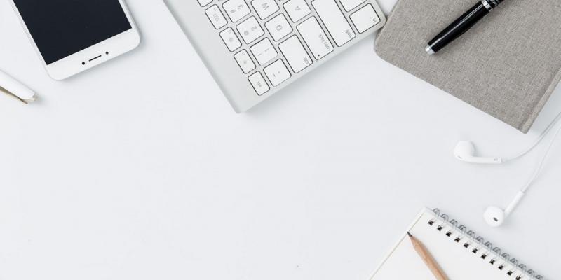 Photo of office supplies on desk.